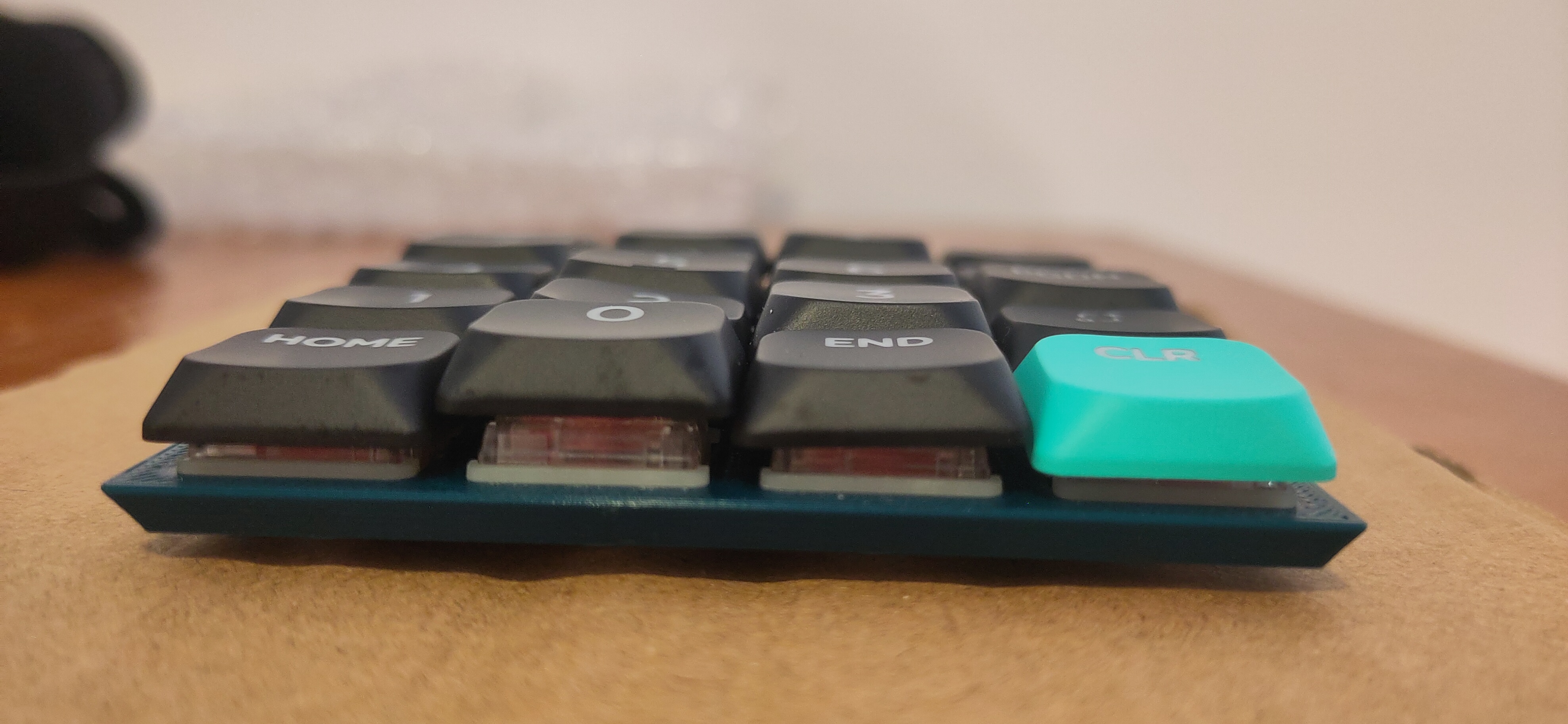 Image of side profile with keys not fitting well next to each other