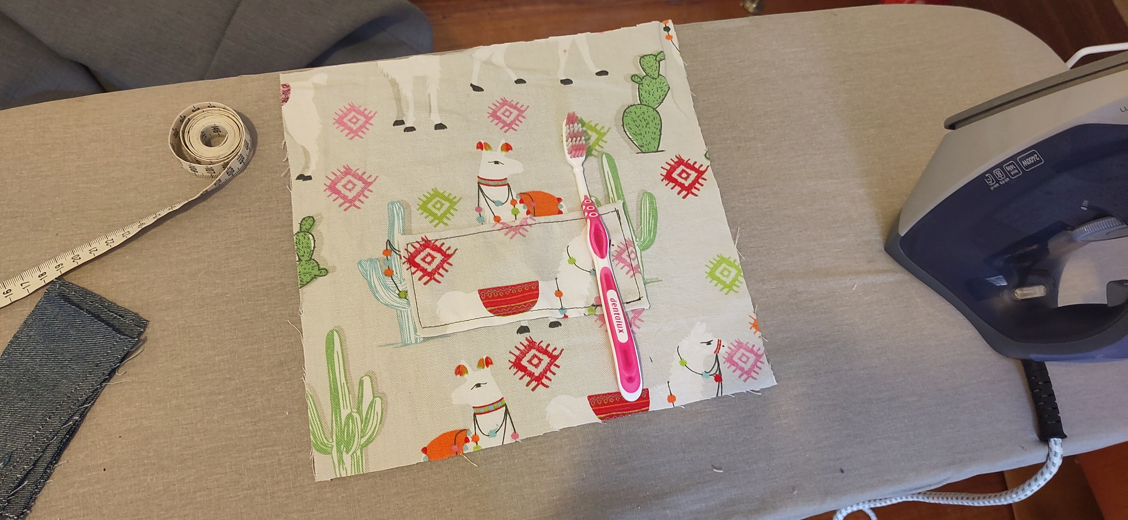 Image of partially assembled back panel with brush holder